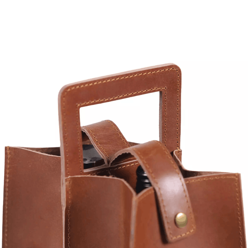 https://www.lcvdesignsndecor.co.za/shop/seasonal-celebrations/gifts/leather-accessories/double-wine-bottle-holder-tan/ Double Wine Bottle Holder Tan Top View