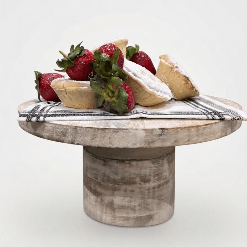 https://www.lcvdesignsndecor.co.za/shop/kitchen-dining/tableware-serving/serveware/cake-food-display-stands/mango-wood-cake-stand/ Mango Wood Cake Stand 25x25x15cm Lifestyle with Clear Background